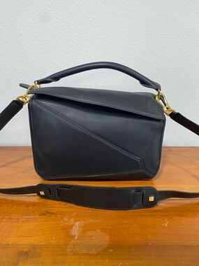Puzzle Medium Leather Crossbody Bag in Black